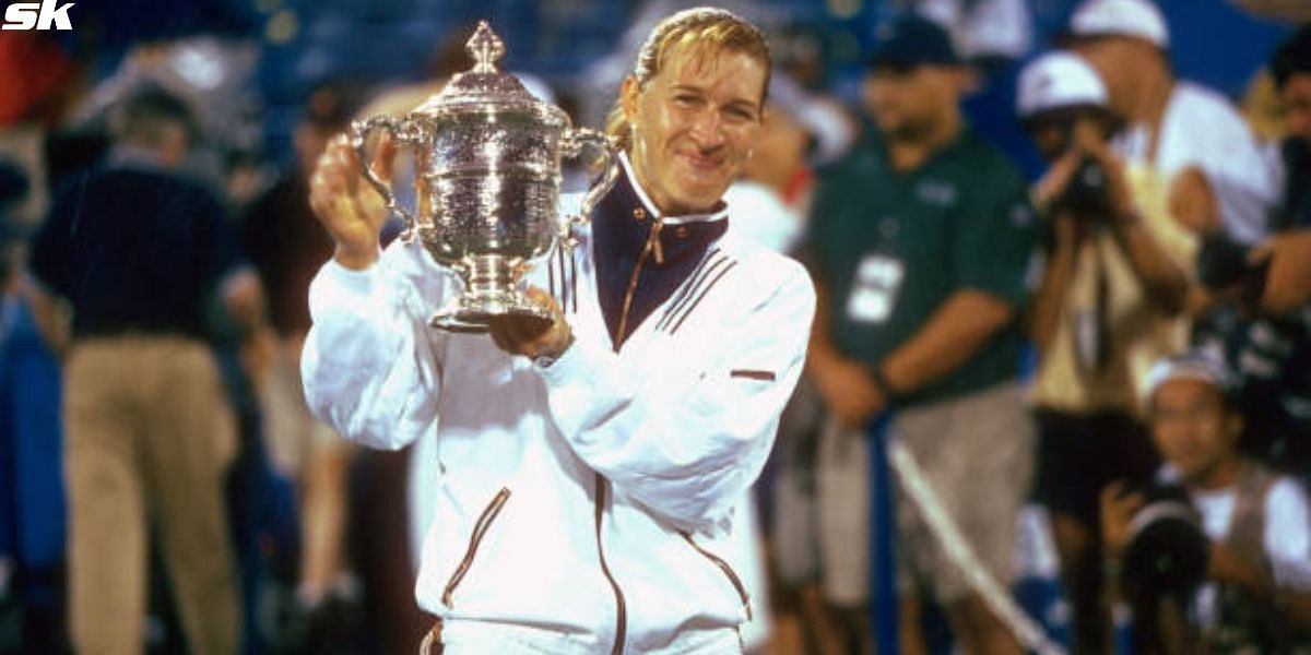 Steffi Graf with the US Open trophy in 1996 [Image Source: Getty Images]