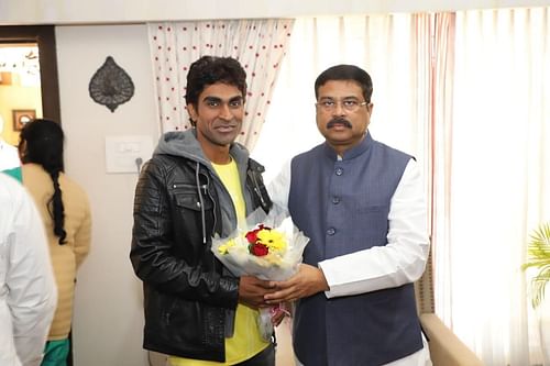 Bhagat with Union Minister Dharmendra Pradhan - Source: PramodBhagat83 on X