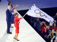 Karen Bass waves the Olympic flag at the closing ceremony of the Paris Olympics - Getty Images