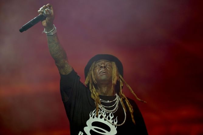 "That owl got melted down" — Fans react as The Weeknd posts 2023 photo of Lil Wayne sporting an XO chain