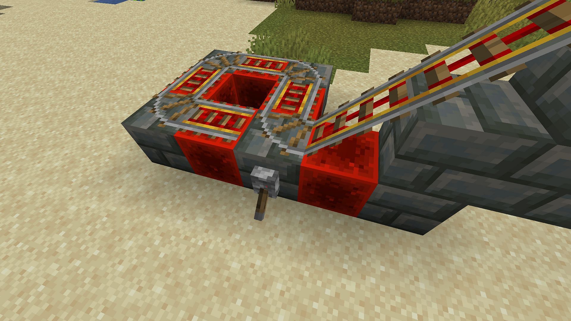 The switch should connect the ramp to the inner powered rail circle (Image via Mojang)