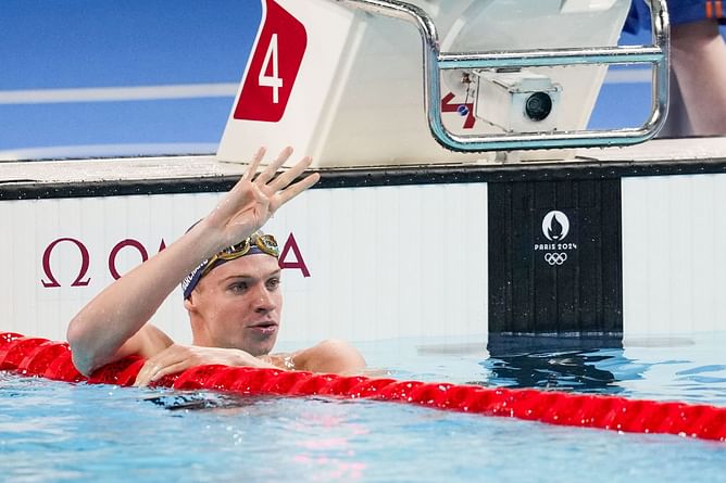 WATCH: Leon Marchand ignores congratulatory handshake from China's coach during the medal ceremony at the Paris Olympics