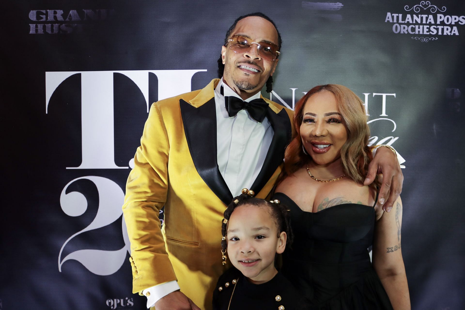 T.I. and Tiny with their youngest child, (Photo by Nykieria Chaney/Getty Images)