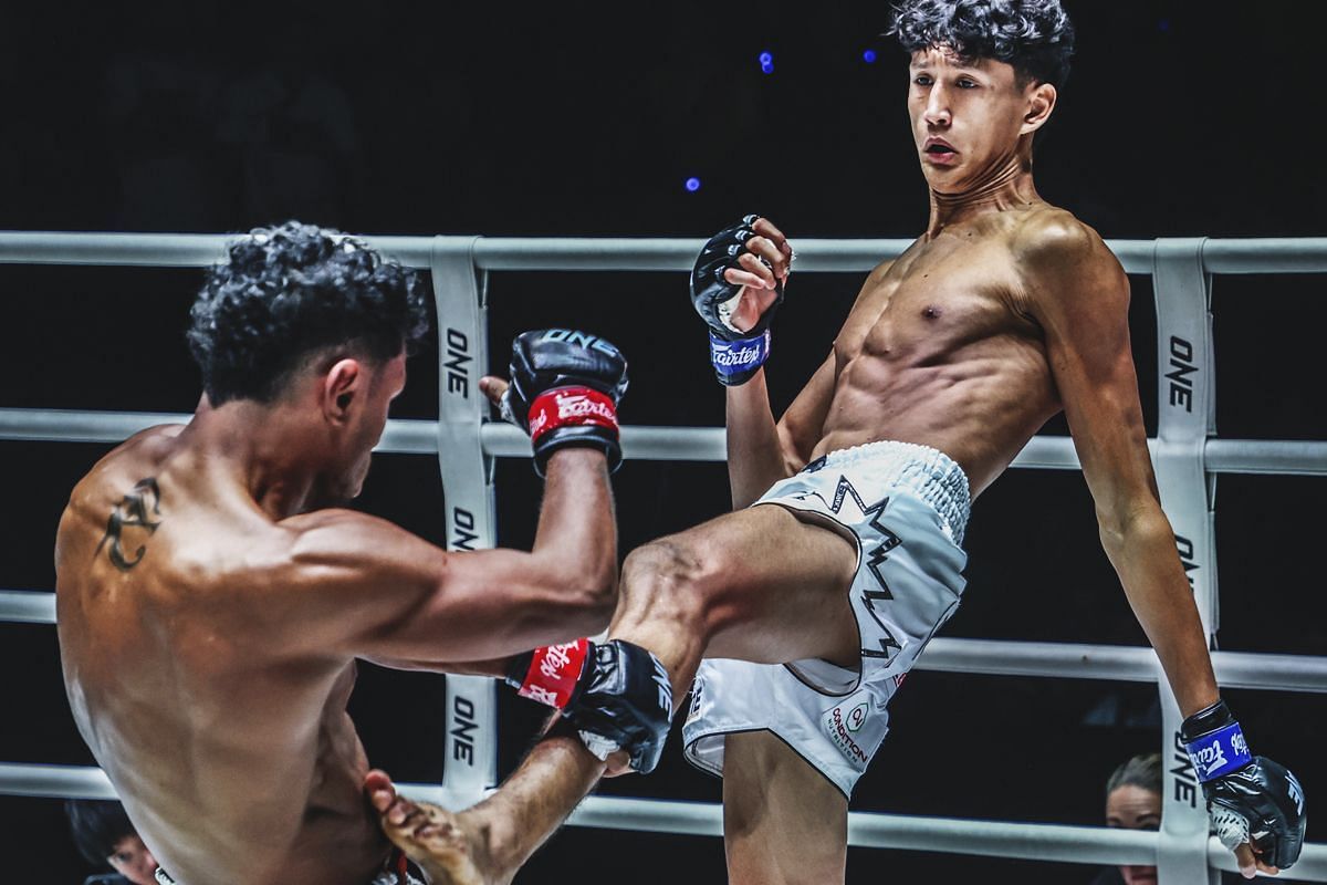 Nabil Anane (R) kicks Felipe Lobo | Photo credit: ONE Championship