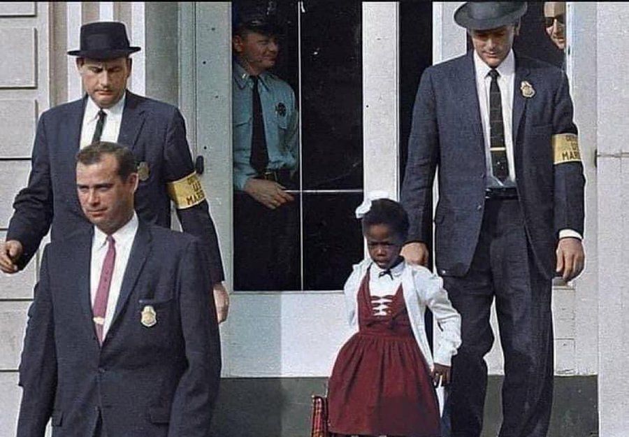 Federal marshals escort Ruby Bridges as she leaves school (Image via x/@BerniceKing)