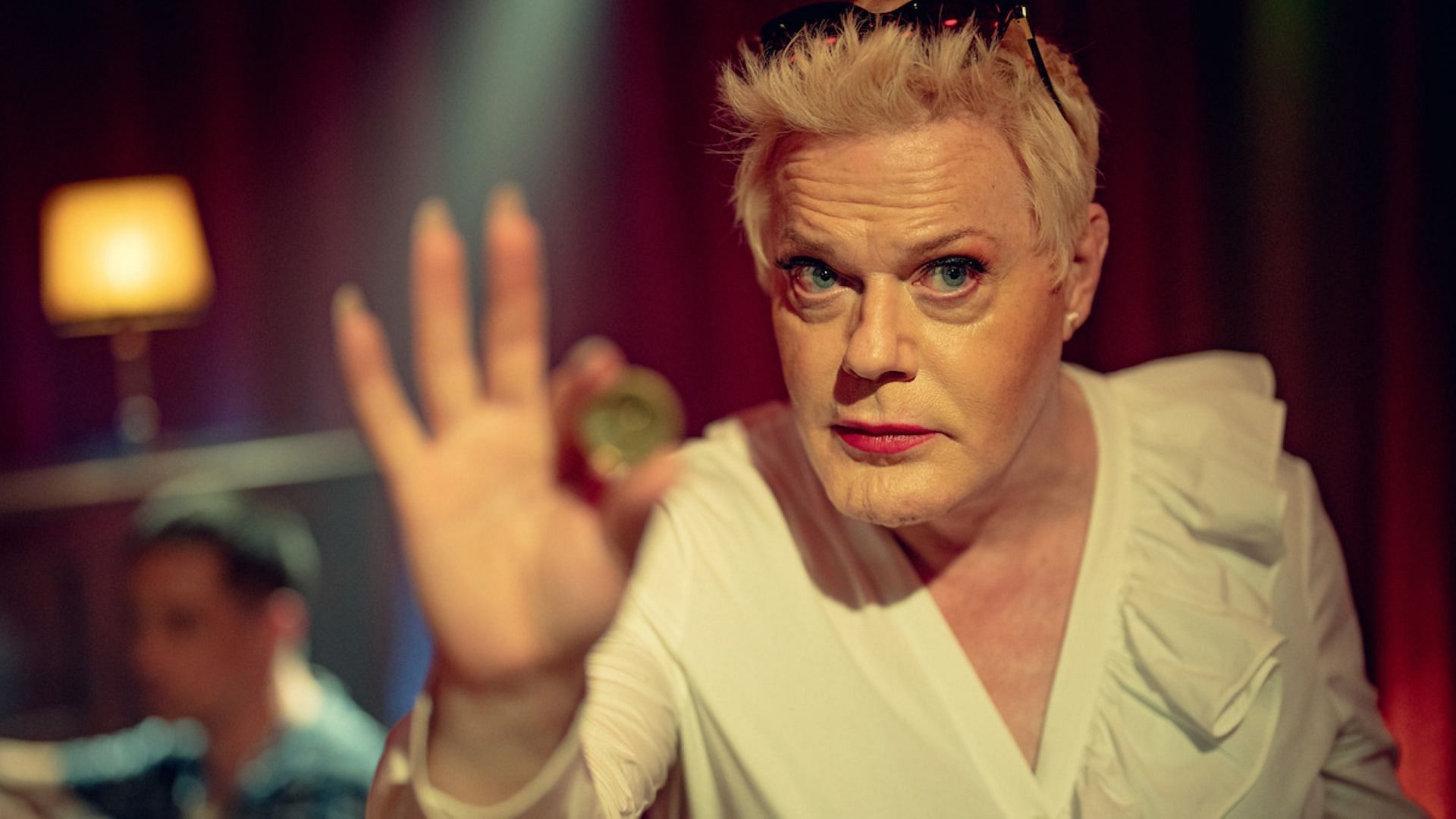 Suzy Eddie Izzard as Lachesis (image via Netflix)