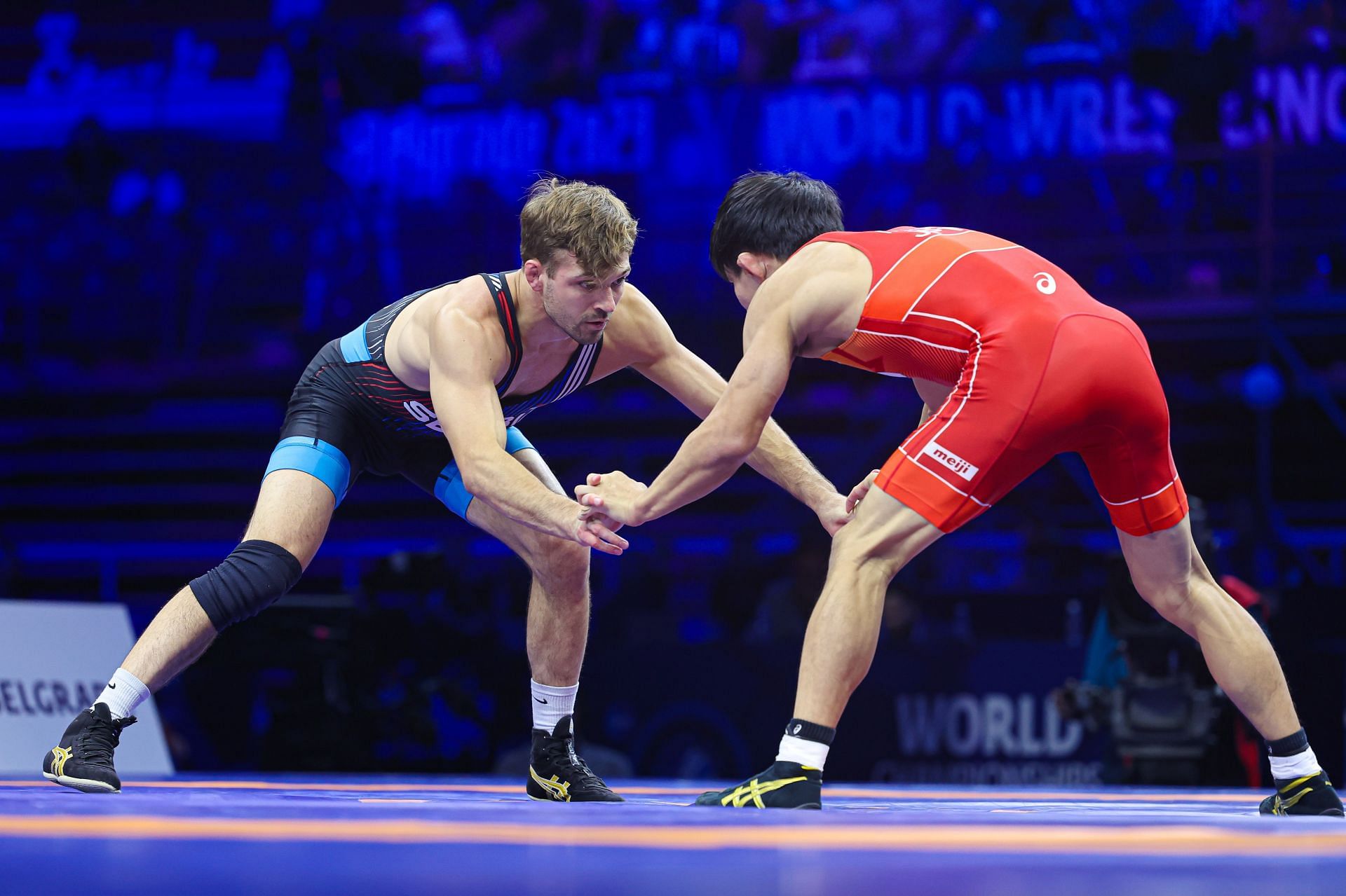 Stevan Micic (L) against Rei Higuchi of Japan in the finals of the 2023 World Wrestling Championships - Getty Images