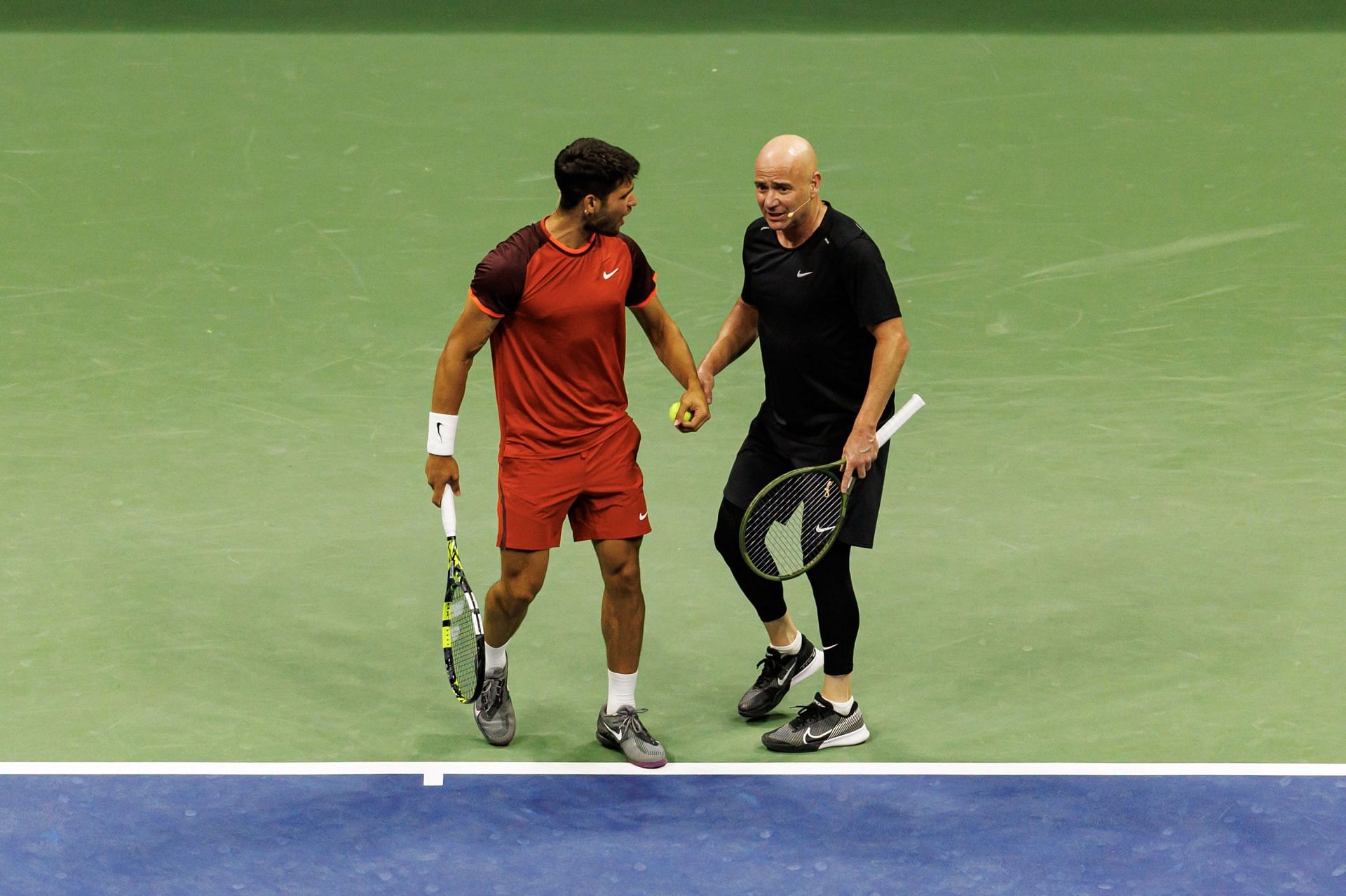 Carlos Alcaraz and Andre Agassi at the 2024 US Open Fan Week. (Image: Getty)