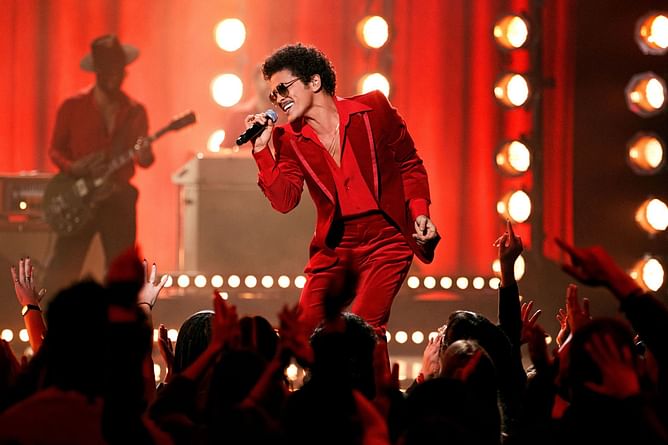 Bruno Mars pauses Intuit Dome show to call for security to check out a situation unfolding in the front rows