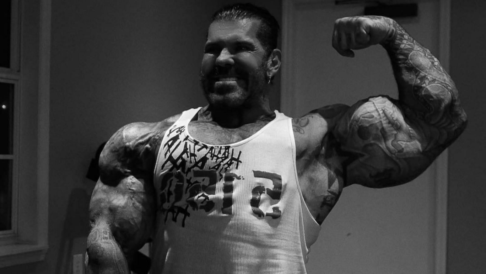 Rich Piana flexing his arms