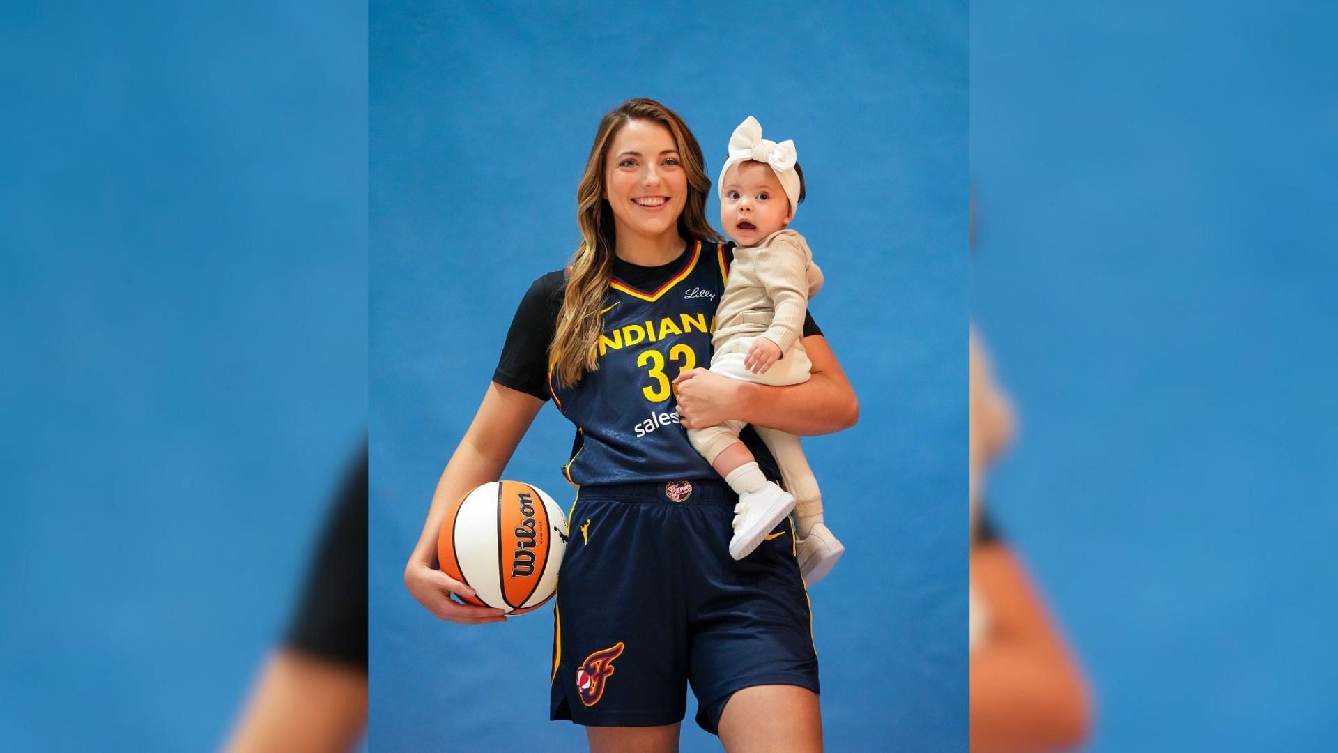 Katie Lou Samuelson poses with her daughter Aliyah on Media Day (Photo from the Indiana Fever&#039;s Facebook)