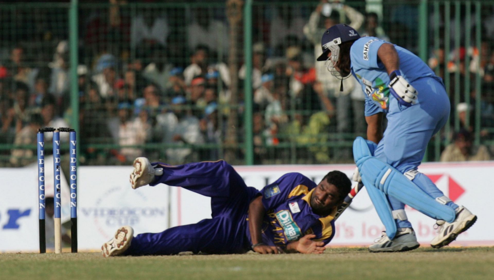 Muttiah Muralitharan stops the ball in an ODI against India. (Image Credits: Getty Images)