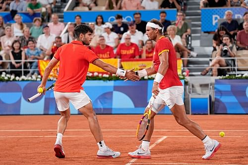 Carlos Alcaraz and Rafael Nadal at the Olympic Games Paris 2024. (Image via Getty).