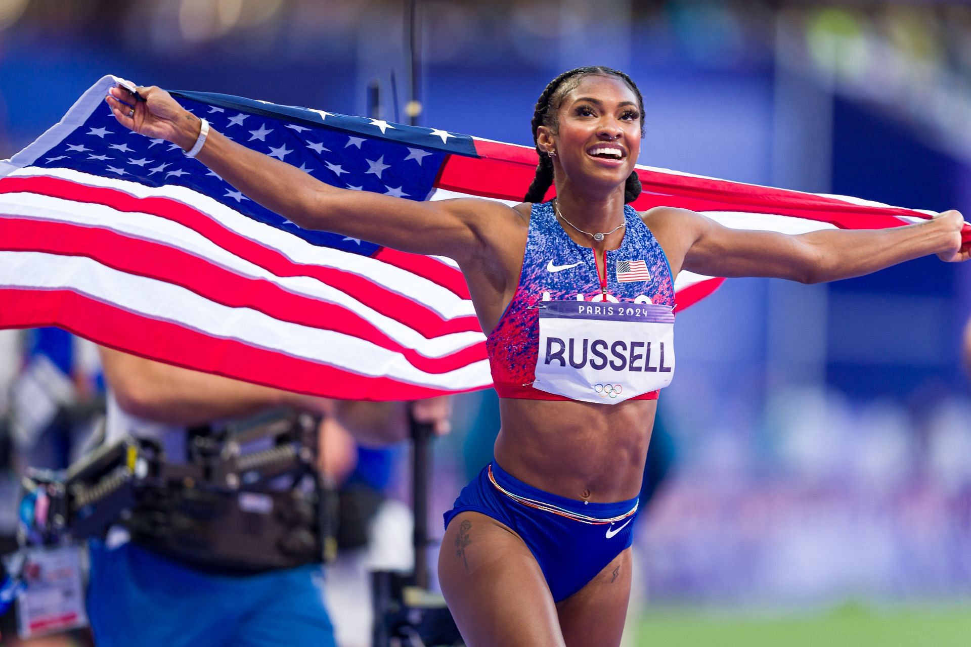 Masai Russell reacts to getting featured on Times Square billboard ...