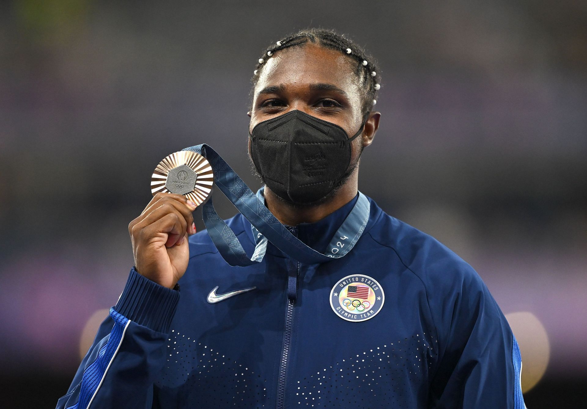 Noah Lyles of Team USA celebrates with his men&#039;s 200m bronze medal at the Stade de France during the 2024 Summer Olympic Games in Paris, France. (Photo via Getty Images)