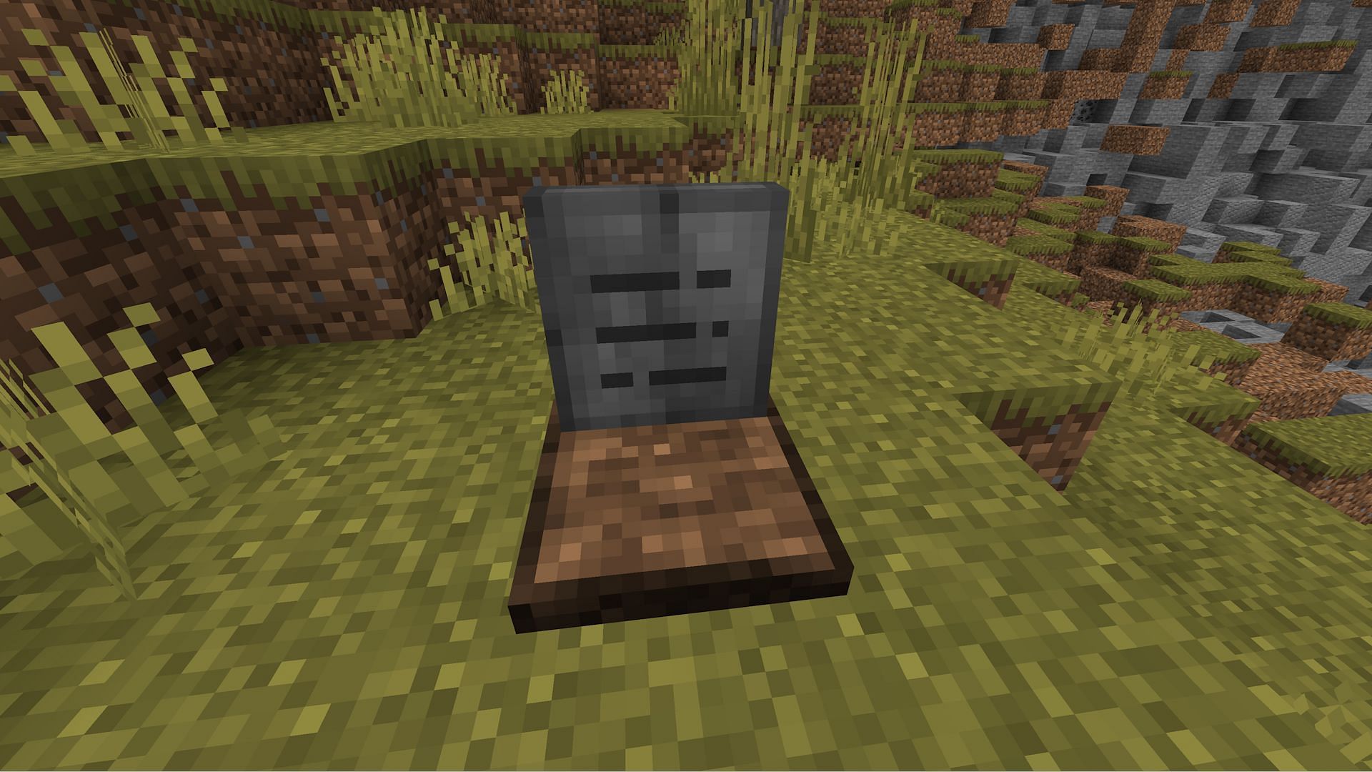 A gravestone dropped after a player death (Image via Darkosto/Mojang)