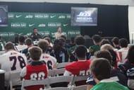 Greg Nejmeh, who is the Director of Player Personnel, gives his account of what professional football teams look for in prospective players to an attentive audience (Photo Credit: Kerry E. Porter)