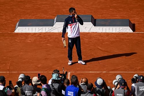 Novak Djokovic kisses his gold medal at the Olympic Games Paris 2024. (IMAGE: Getty)