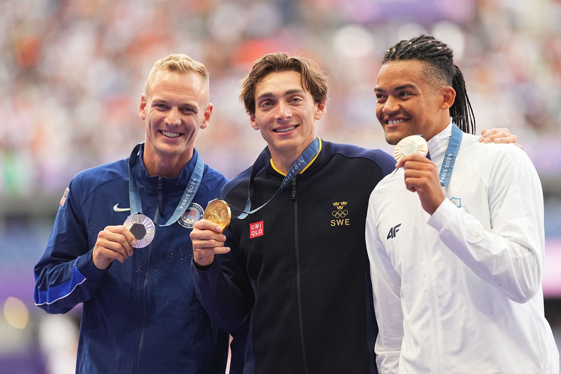 Armand &#039;Mondo&#039; Duplantis of Sweden along with silver medalist Sam Kendricks of USA and Emmanouil Karalis of Greece at the men&#039;s pole vault medal ceremony at Paris Olympics 2024 [Image Source : Getty]