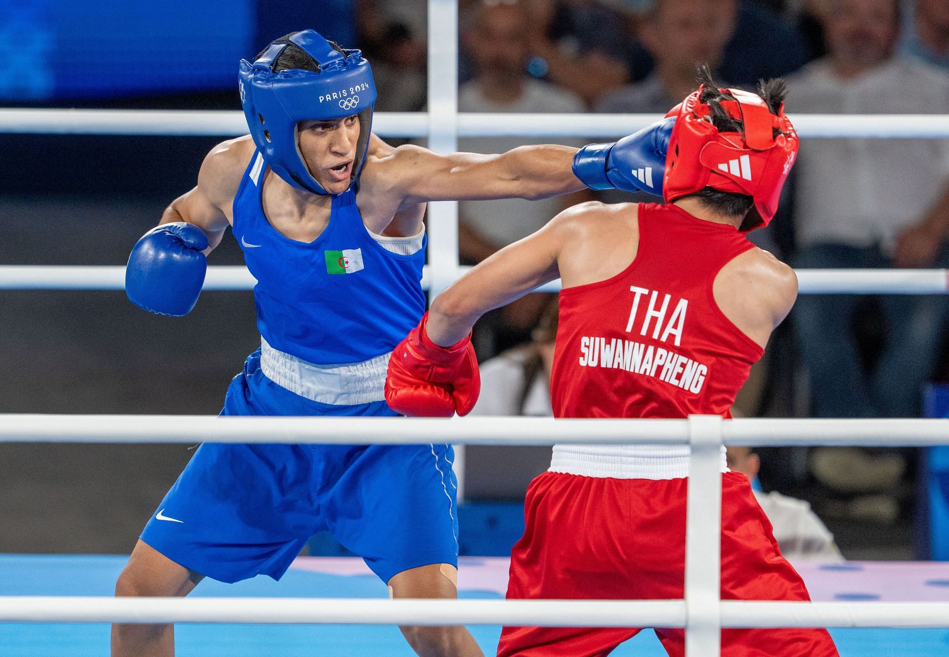 Imane Khelif of Algeria [in blue] in action during the semifinals at the 2024 Paris Olympics [Image Source: Getty]