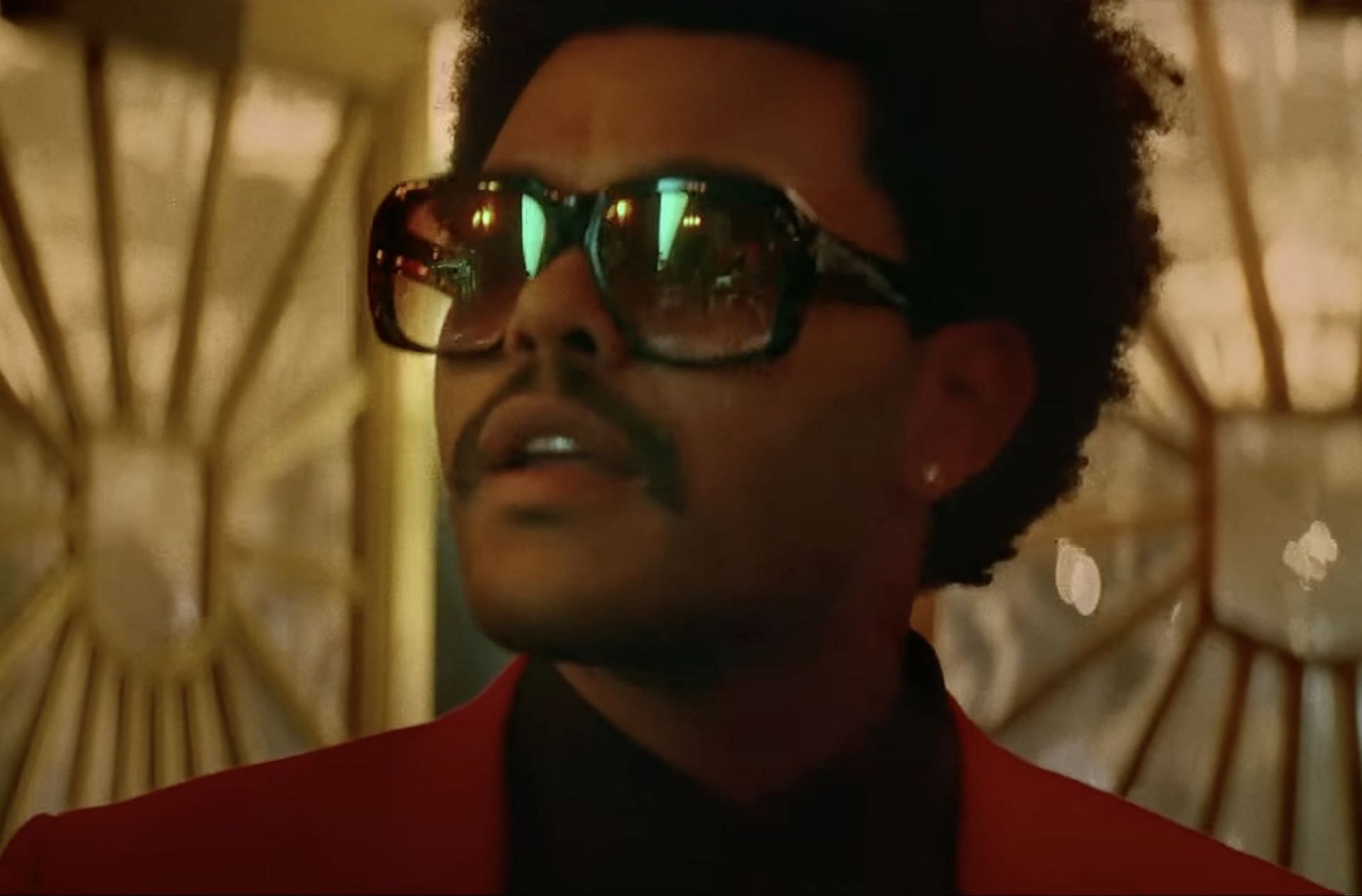 The Weeknd in the Blinding Lights music video (Image via YouTube/The Weeknd)