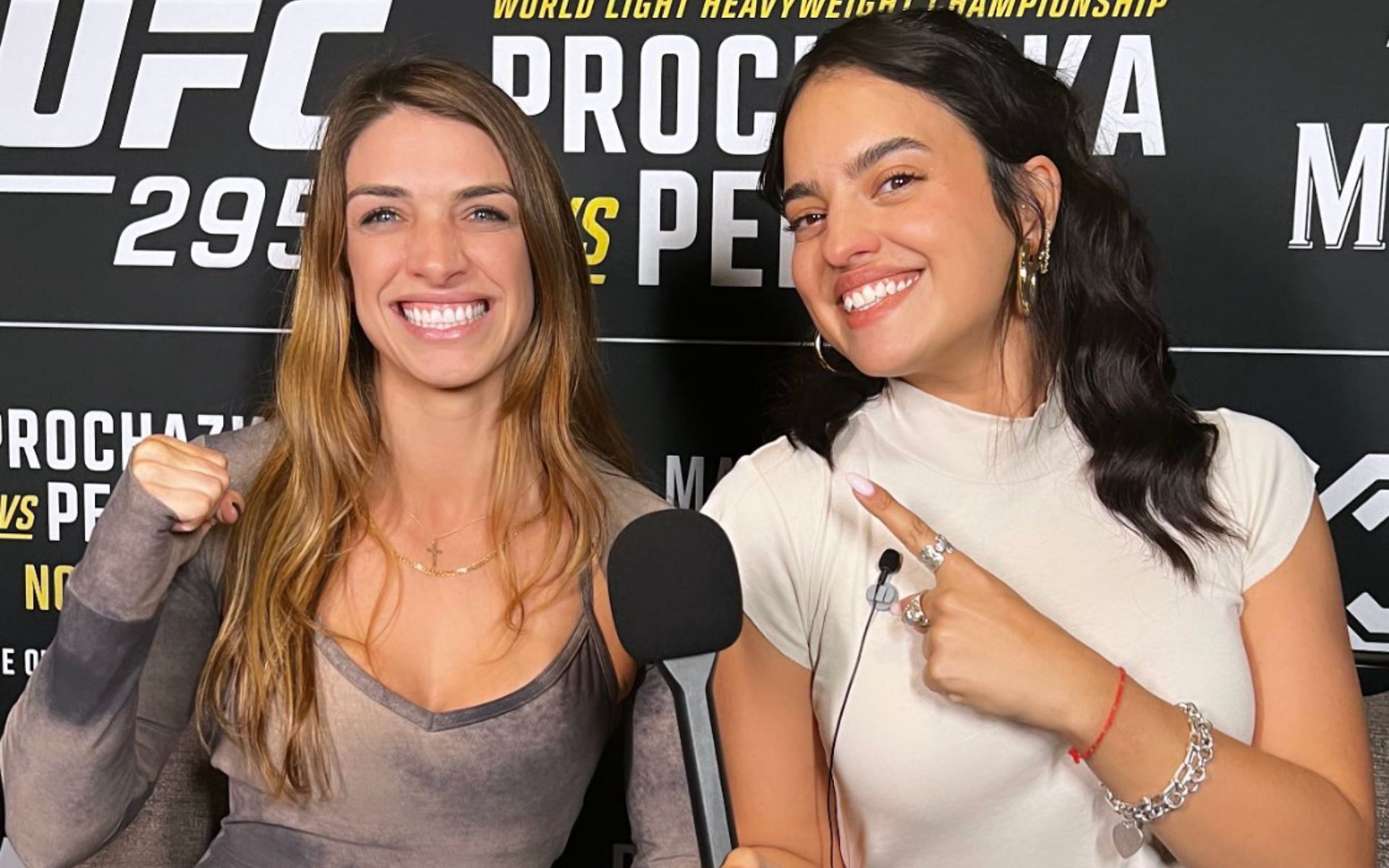 Nina-Marie Daniele (right) reacts to Mackenzie Dern (left) making weight for her fight with Loopy Godinez at UFC Abu Dhabi. [Image courtesy: @ninamdrama on X]