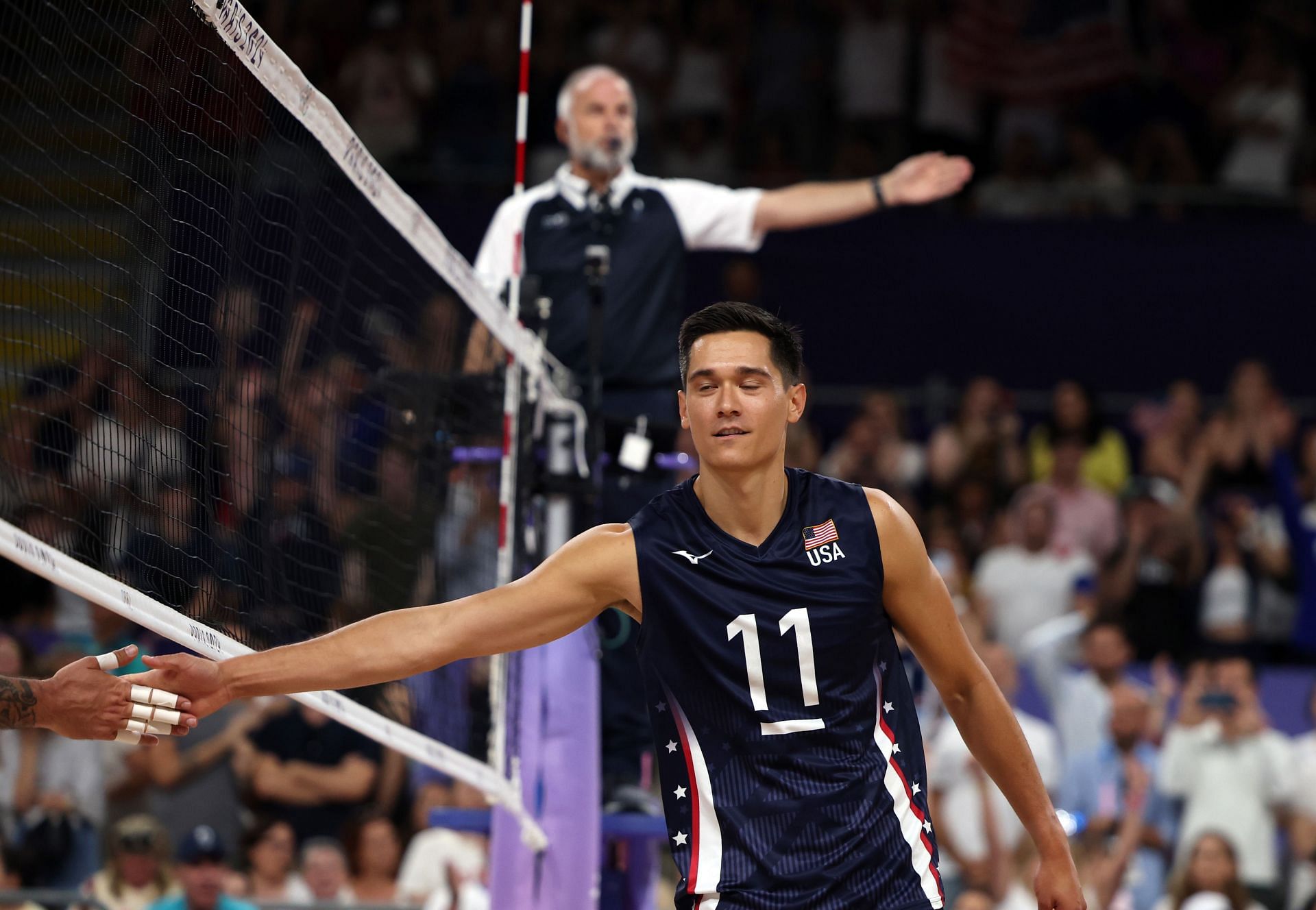 Micah Christenson of Team United States celebrates during the Men&#039;s Preliminary Round Pool C volleyball match at the Olympic Games 2024 in Paris, France - Getty Images