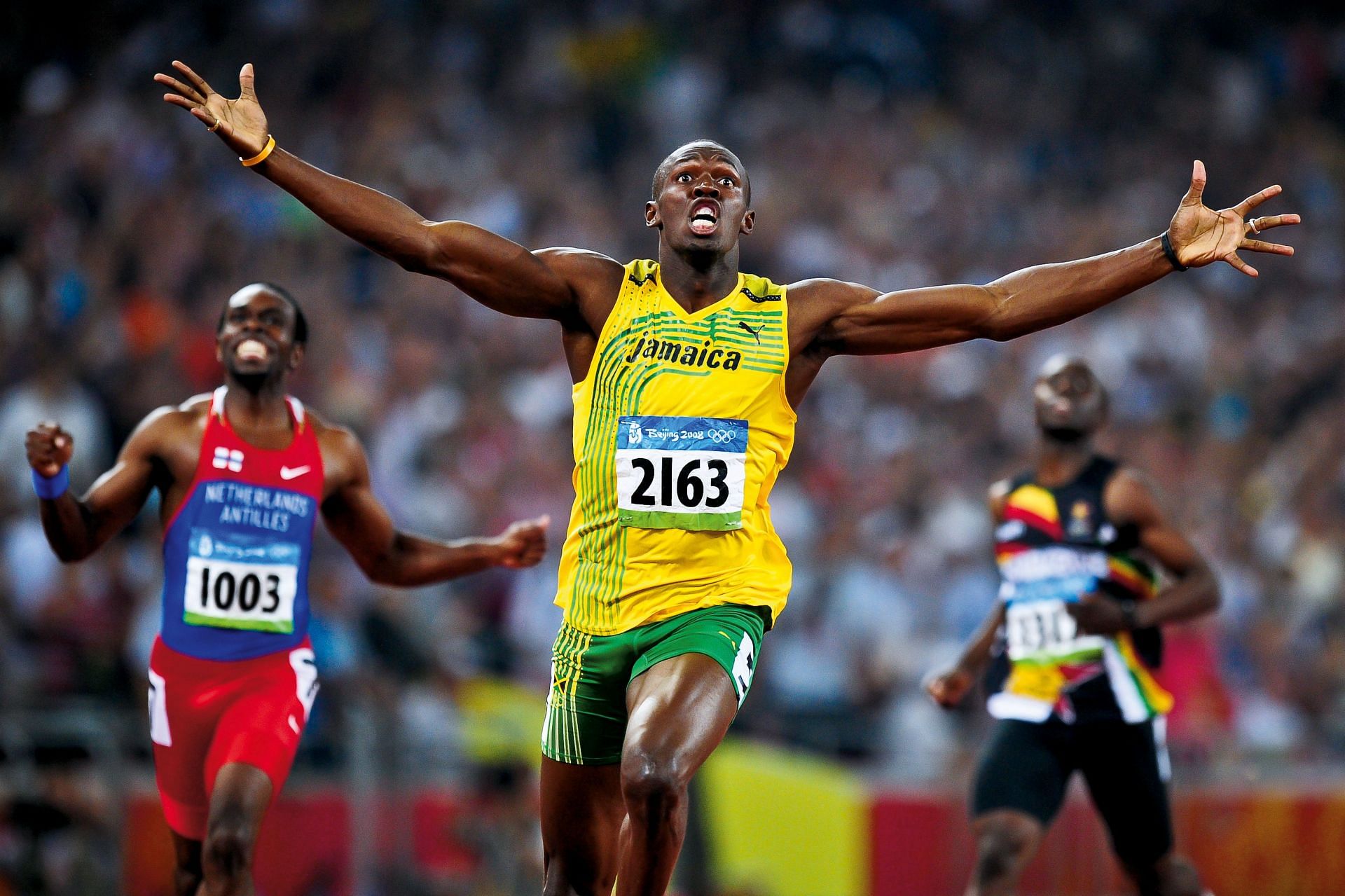 Usain Bolt at Beijing 2008 in an image from the book &quot;In The Moment&#039; by Tom Jenkins - Getty Images