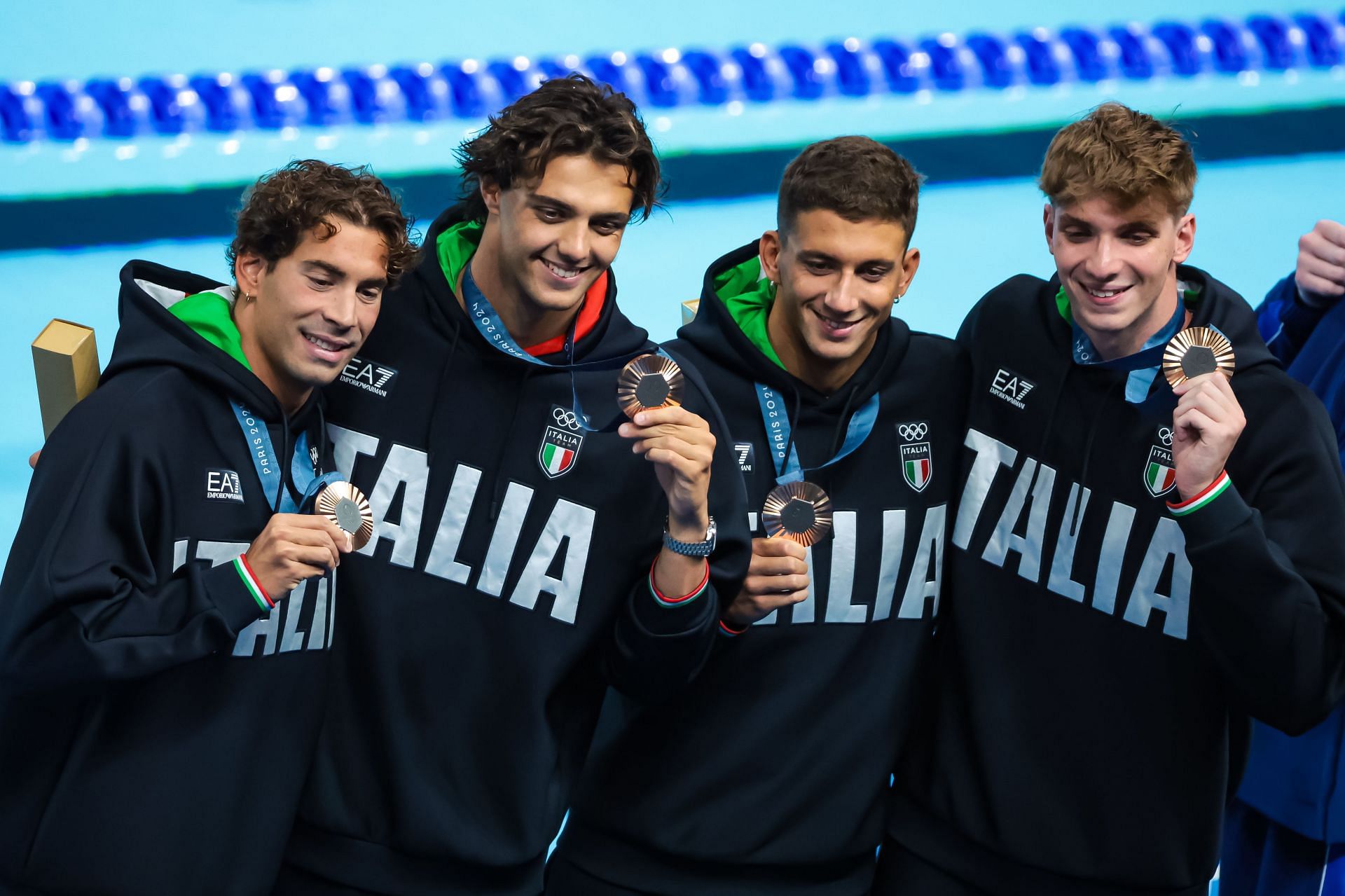 Alessandro Miressi, Thomas Ceccon, Paolo Conte Bonin, and Manuel Frigo of Team Italy posing after winning the bronze medal in Men&#039;s 4x100m Freestyle Relay Finals at the Olympic Games 2024 in Paris, France. (Photo by Getty Images)