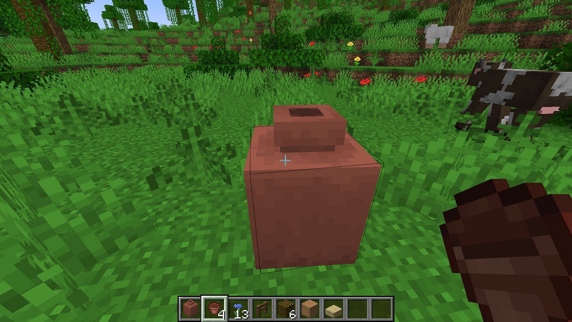 A decorated pot can only contain a stack of one item (Image via Mojang Studios)