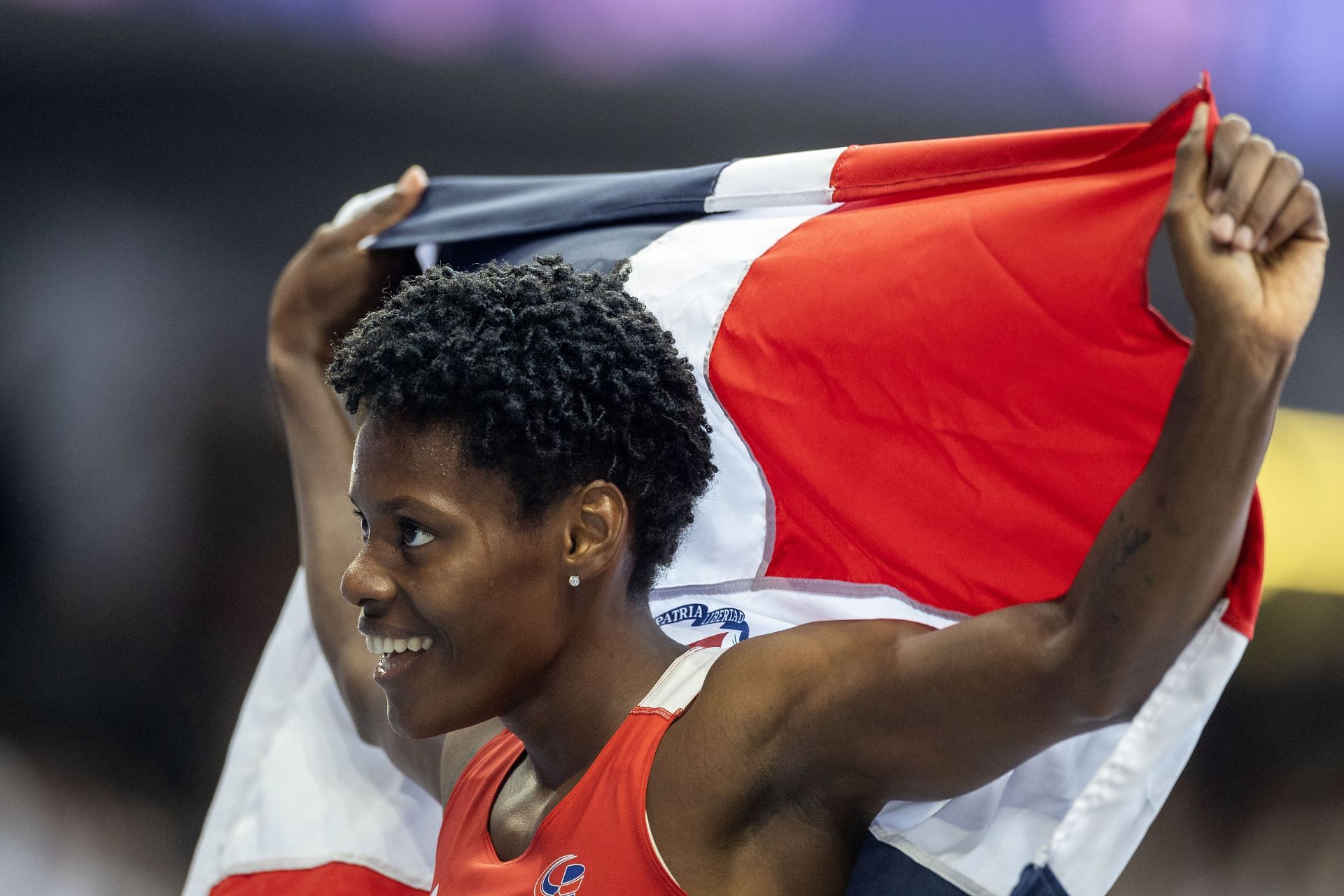 Marileidy Paulino of the Dominican Republic after establishing a new Olympic record in the women&#039;s 400m at the Paris Olympics [Image Source: Getty]