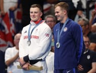 Adam Peaty of Great Britain with Nic Fink of USA after winning the silver medal in the men's 100m breaststroke at the 2024 Paris Olympics - Getty Images