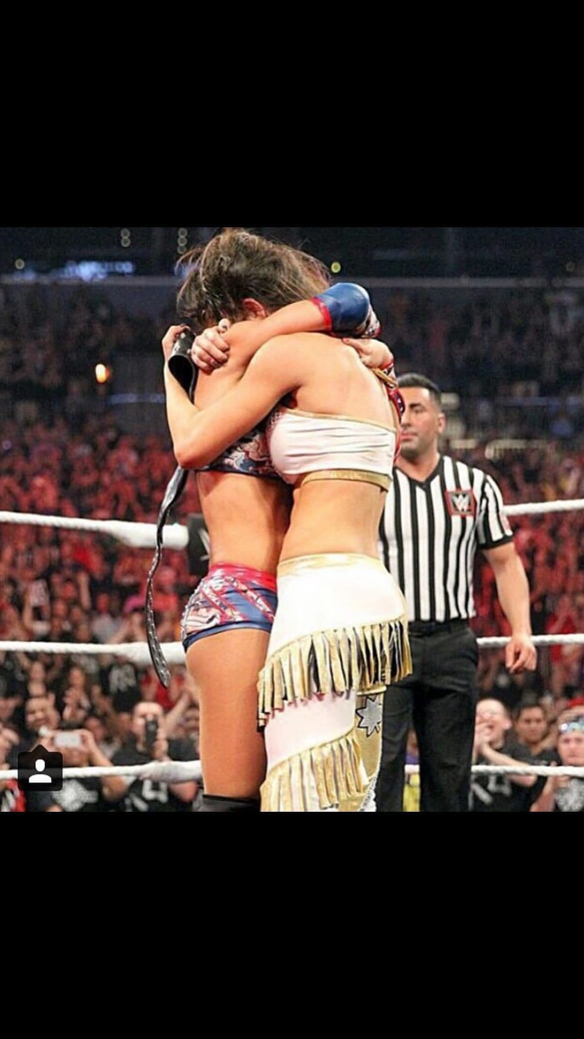 Bayley and Sasha Banks hugging it out after their match. [Image credits: Bayley&#039;s official Instagram handle]