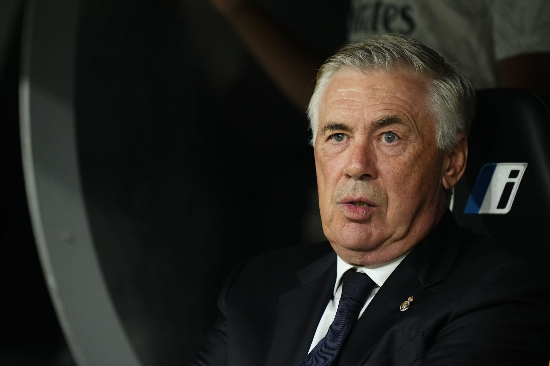 Real Madrid boss Carlo Ancelotti looks on.