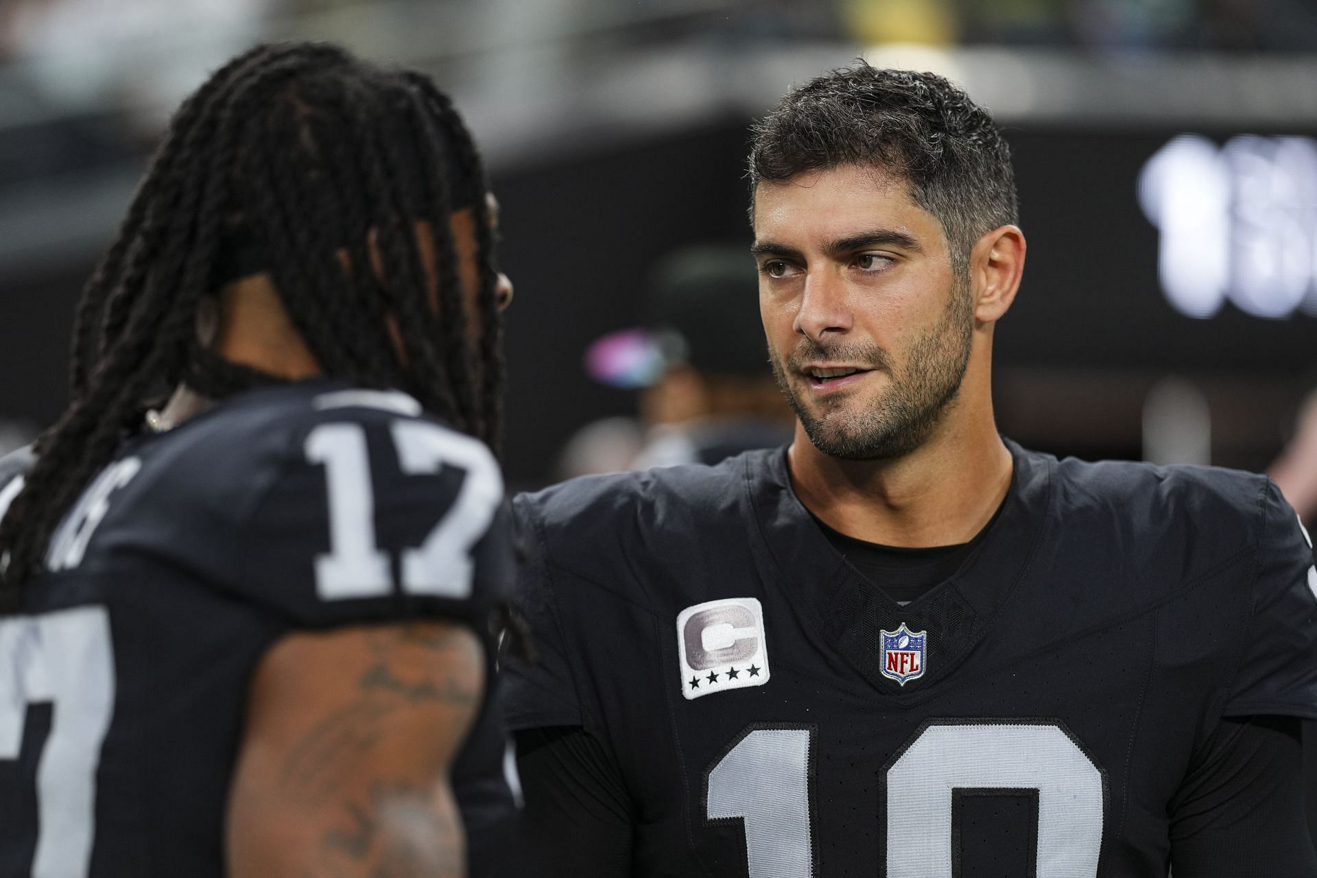 Davante Adams, left, Jimmy Garoppolo, right during Green Bay Packers v Las Vegas Raiders - Source: Getty