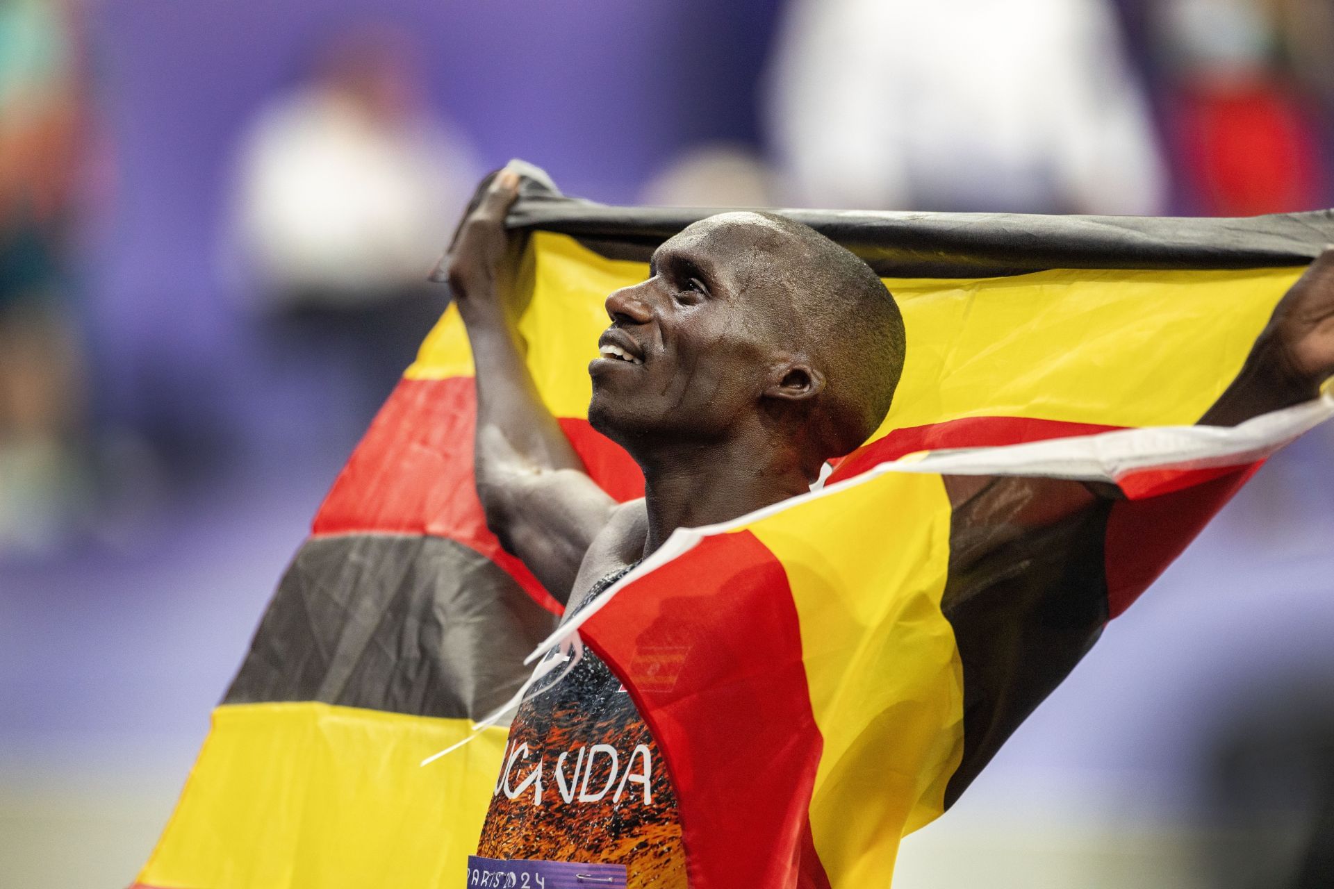 Joshua Cheptegei of Uganda after winning the gold medal in Men's 10000m at the Paris Olympics