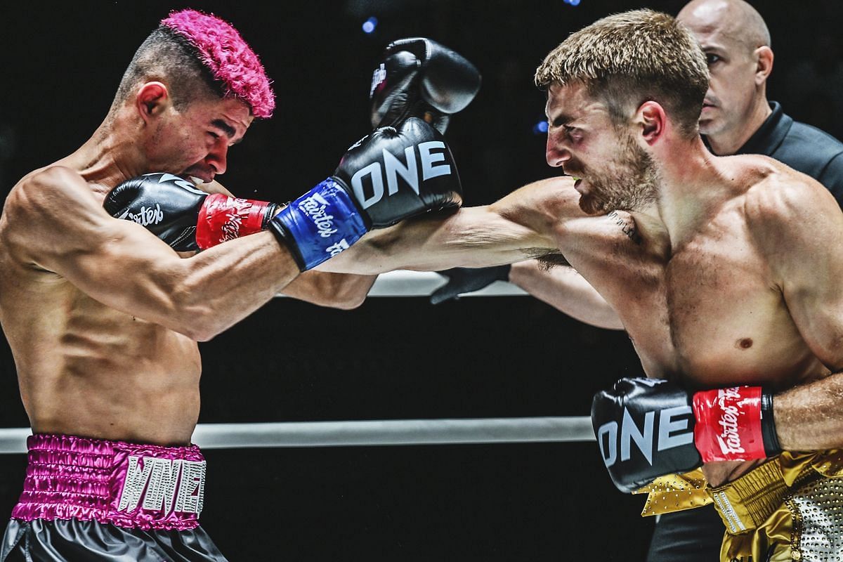 Jonathan Haggerty (R) punches Fabricio Andrade (L) | Image credit: ONE Championship