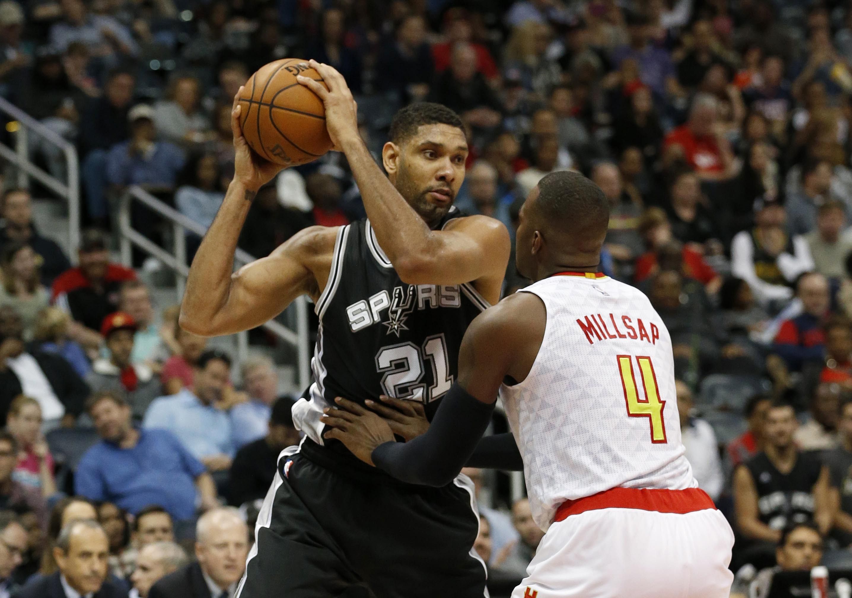 Tim Duncan and Paul Millsap (Image via IMAGN)