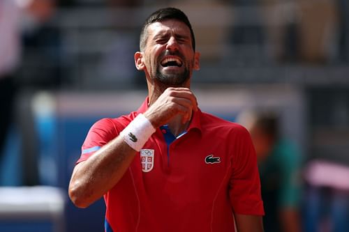 Novak Djokovic celebrates his victory over Carlos Alcaraz