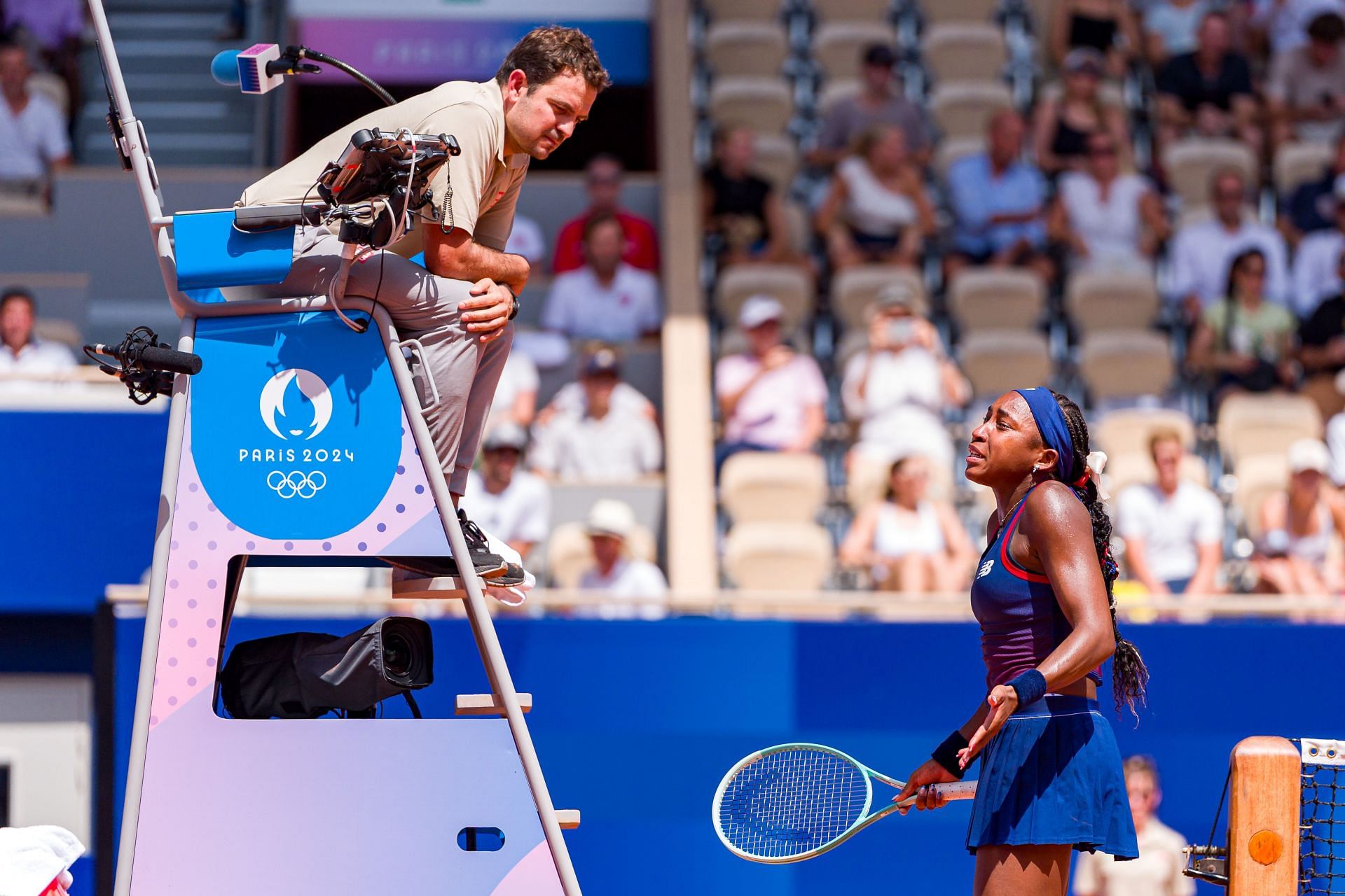 Coco Gauff (right) arguing with the umpire during her third round match at the 2024 Paris Olympics