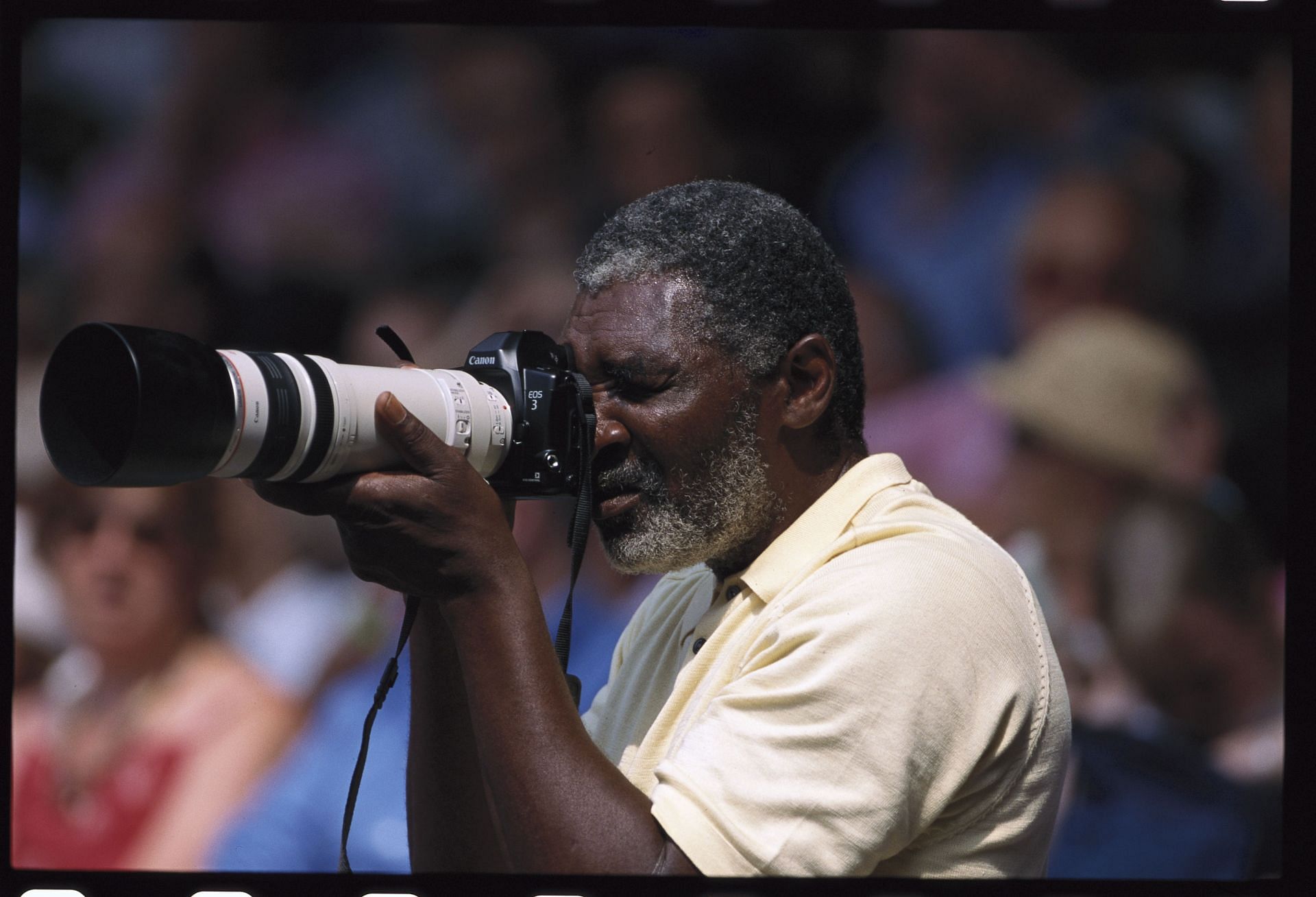 Richard Williams Taking Photographs at Wimbledon - Source: Getty