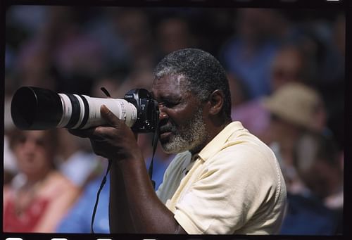 Richard Williams Taking Photographs at Wimbledon - Source: Getty