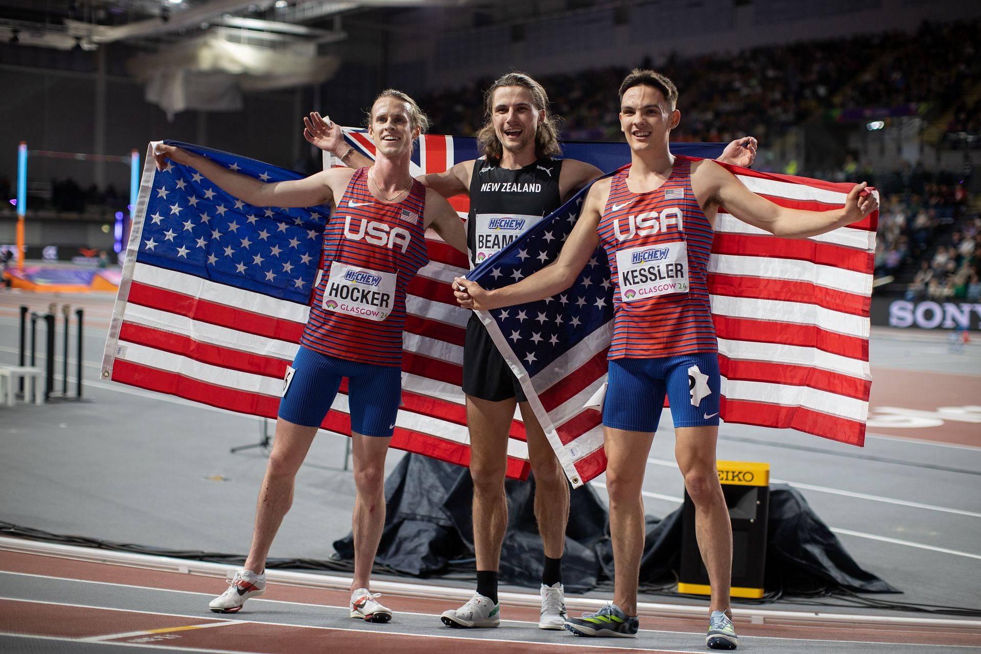 Cole Hocker, Geordie Beamish, Hobbs Kessler pose for photos following the Mens 1500m Final at World Athletics Indoor Championships 2024. (Photo by Sam Mellish/Getty Images)