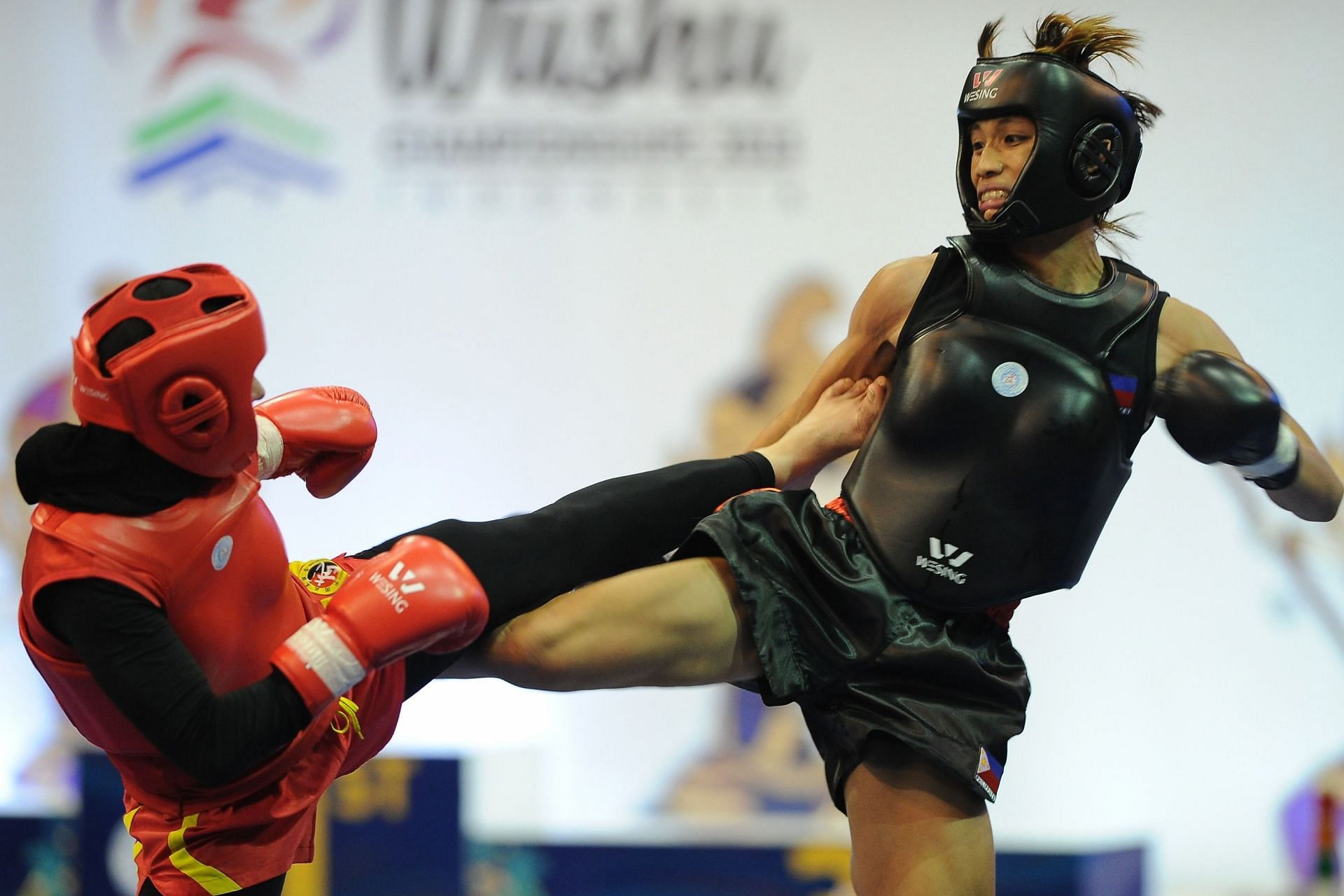 Hergie Bacyadan (black) in action at the 2015 World Wushu Championships - Getty Images