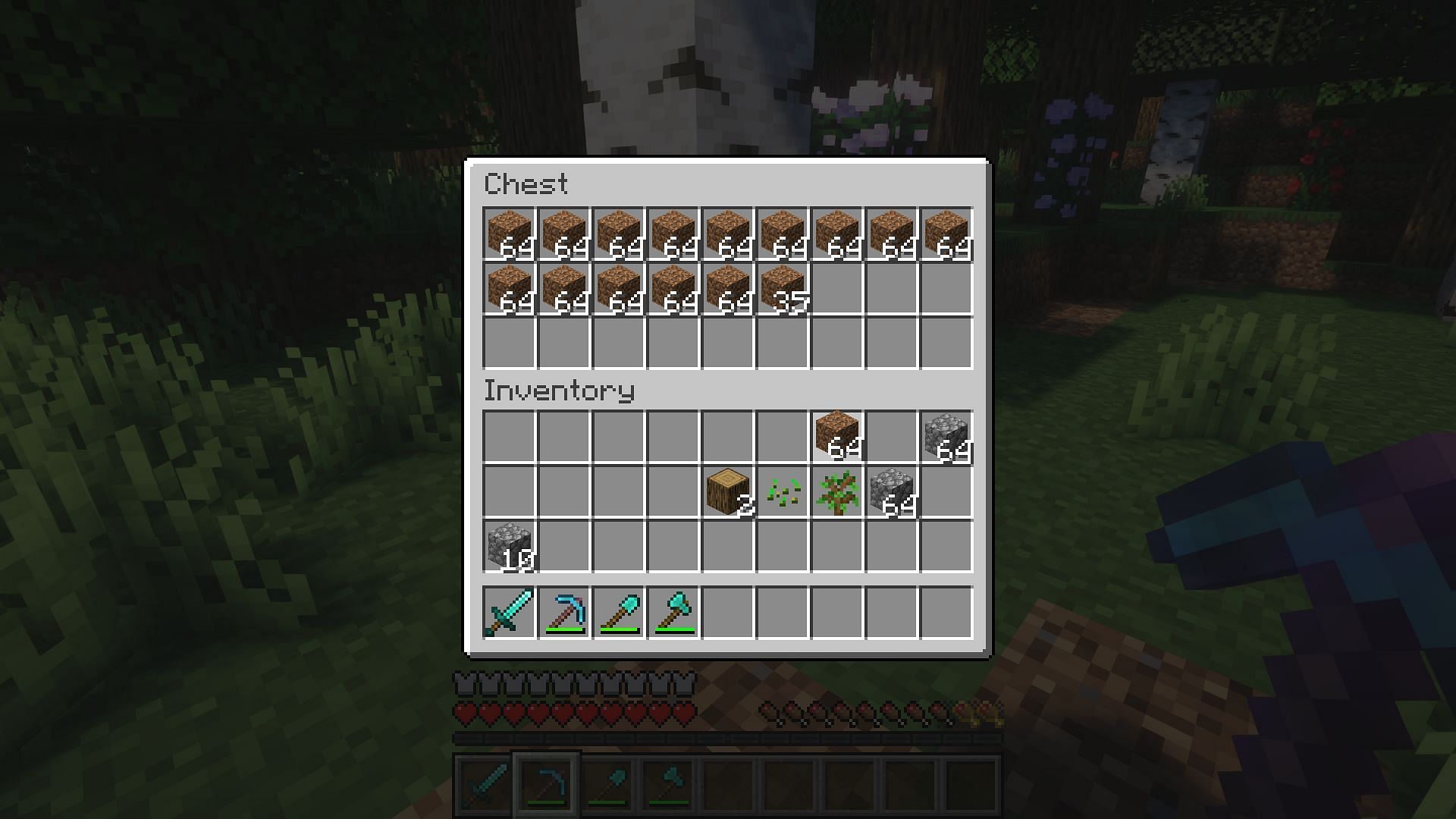 Double clicking while holding an item makes mass storage of like items a breeze (Image via Mojang)