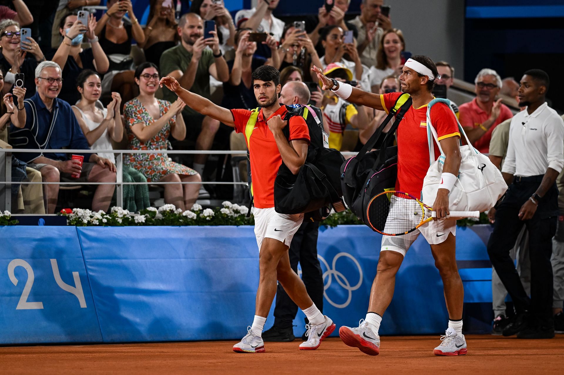 Carlos Alcaraz pictured with Rafael Nadal (R) at the 2024 Paris Olympics - Image Source: Getty