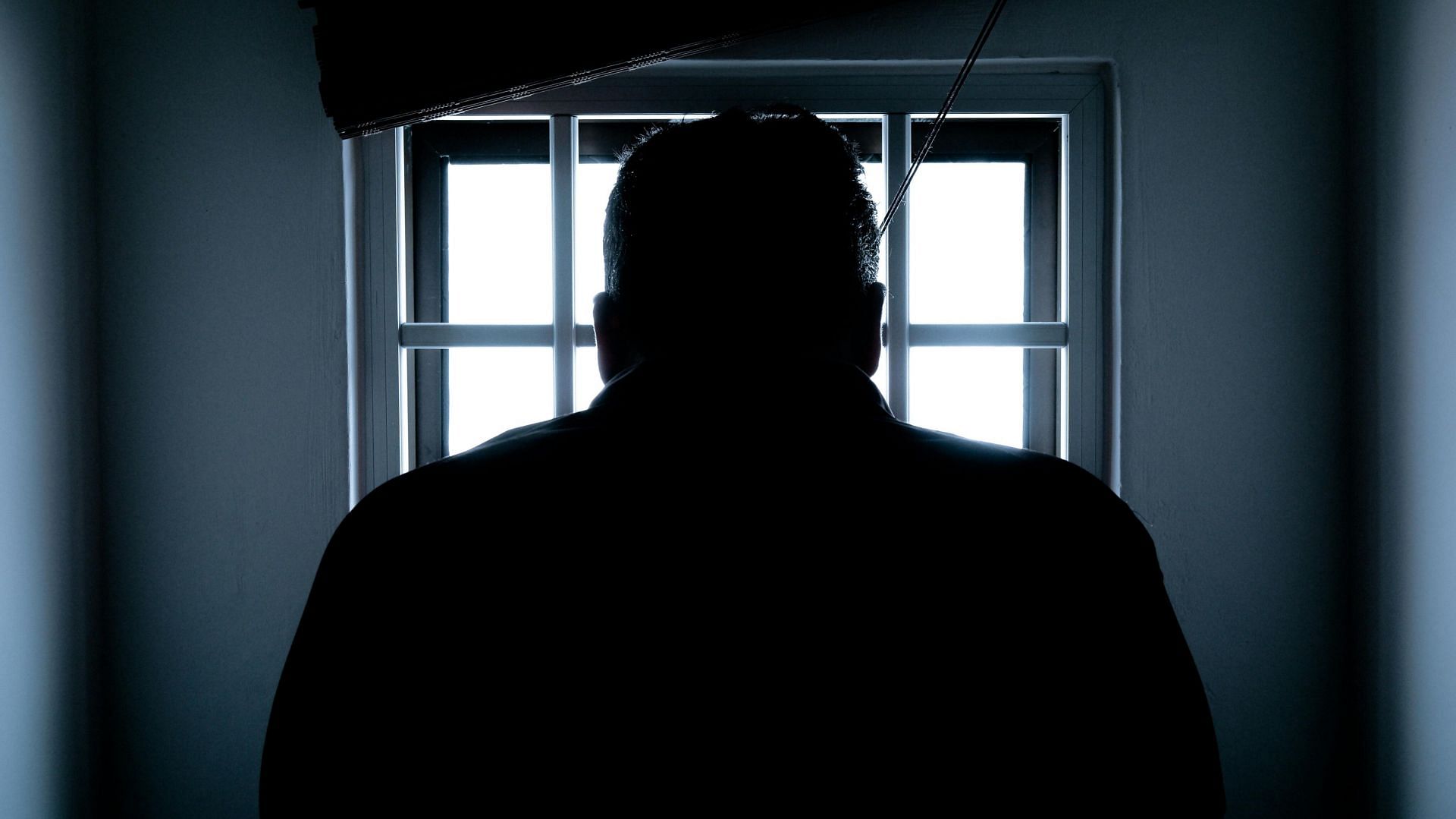 Representative image of a man in prison (Photo by Donald Tong/pexels)