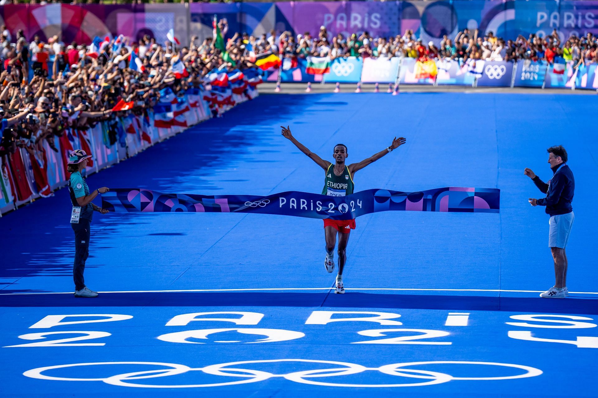 Tamirat Tola of Ethiopia crosses the finish line at the men&#039;s Marathon at the Paris Olympics 2024 [Image Source: Getty]