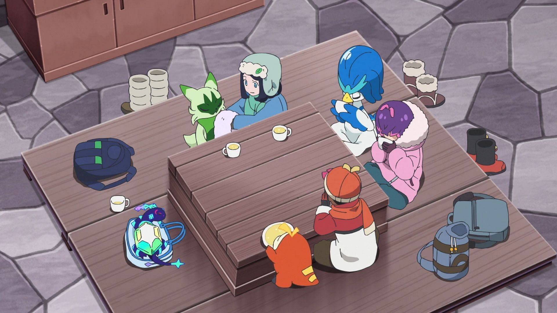 The kids warm up in a nearby cabin in Pokemon Horizons Episode 60. (Image via The Pokemon Company)