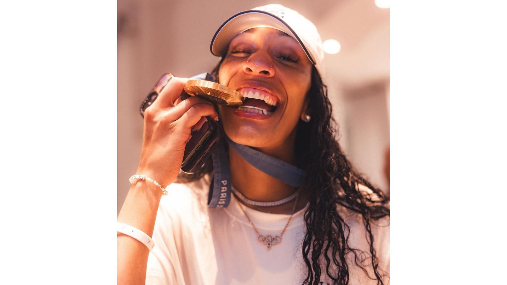 A&#039;ja Wilson shows off her 2024 Paris Olympics gold medal. Image Credit: IG account of A&#039;ja Wilson